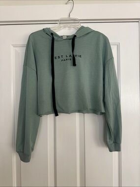 Amazon Sage Green Cropped Hoodie with Black Drawstrings